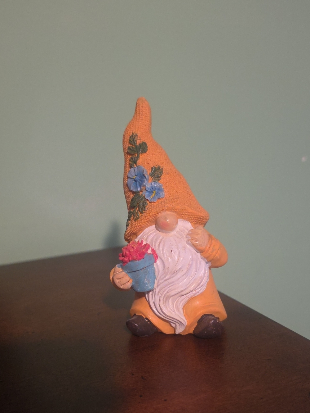 Orange Garden Gnome Figurine with Blue Flower Pot